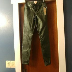 Metallic dark green skinny jeans
